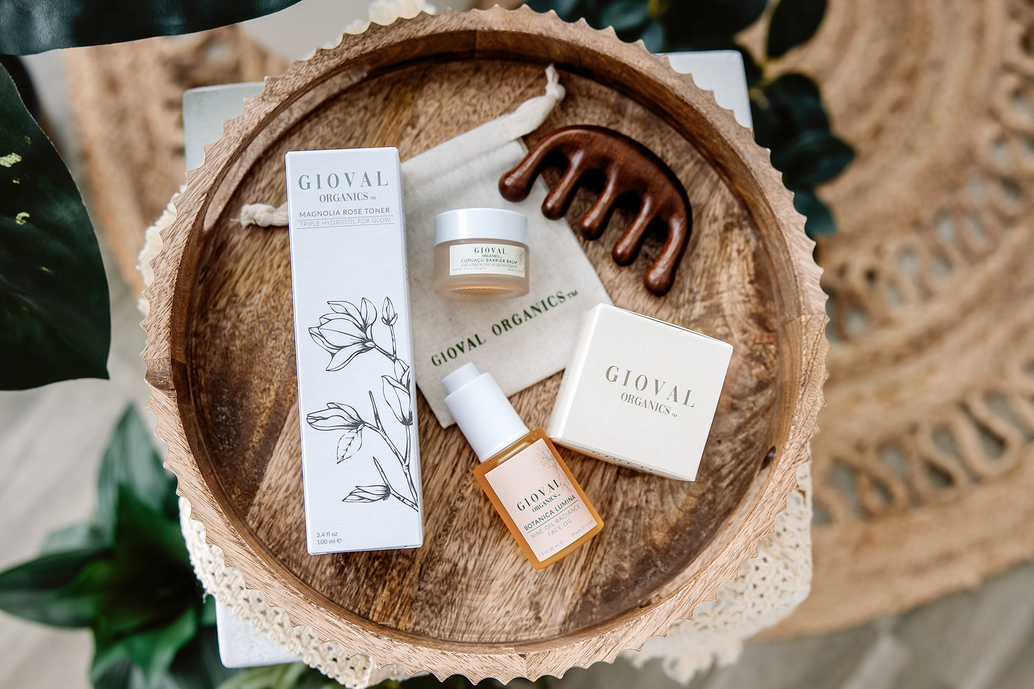GioVal organics Product Shoot with face oil, balm, toner, and gua sha. 